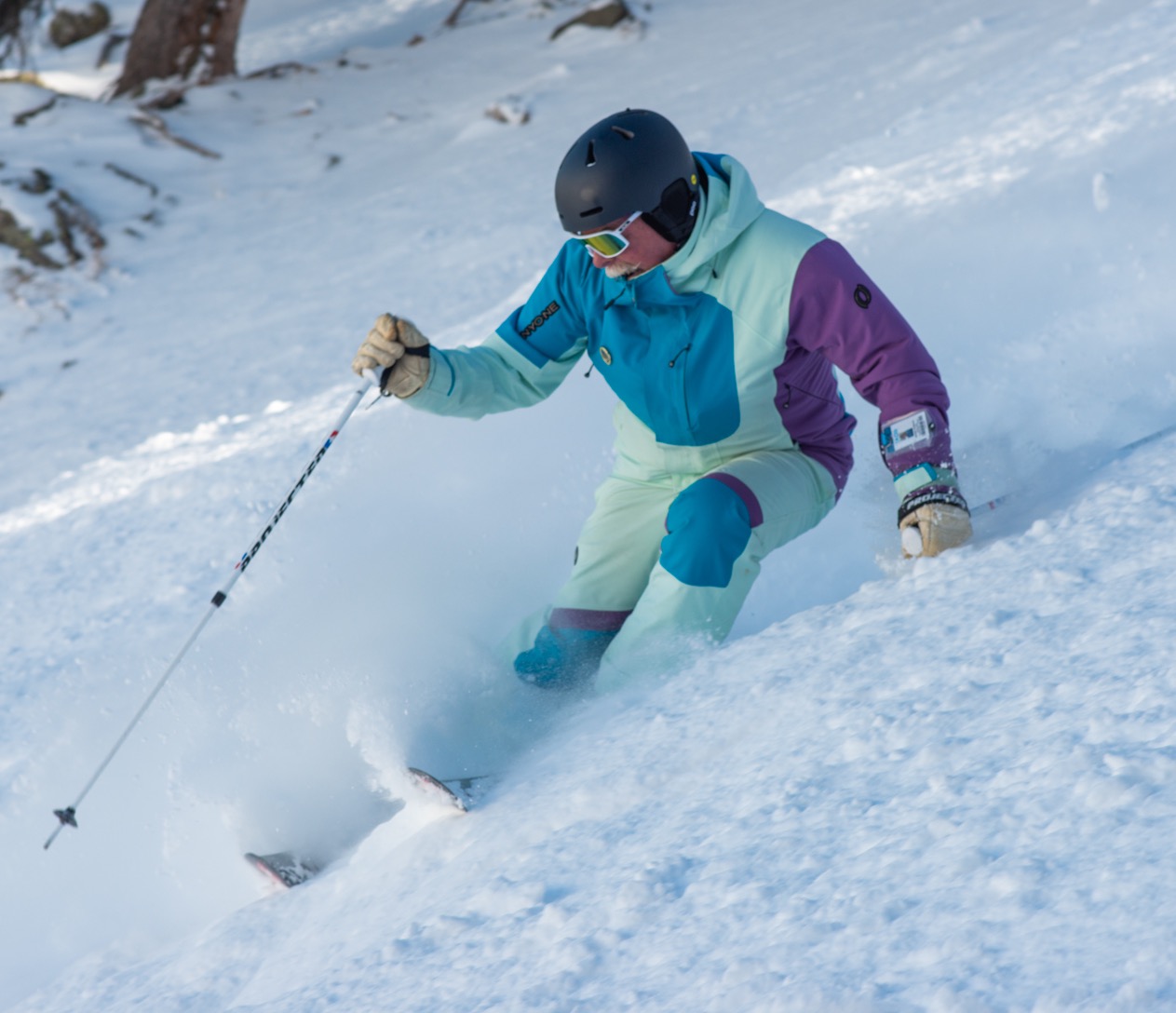 Michael Chandler skiing through deep snow